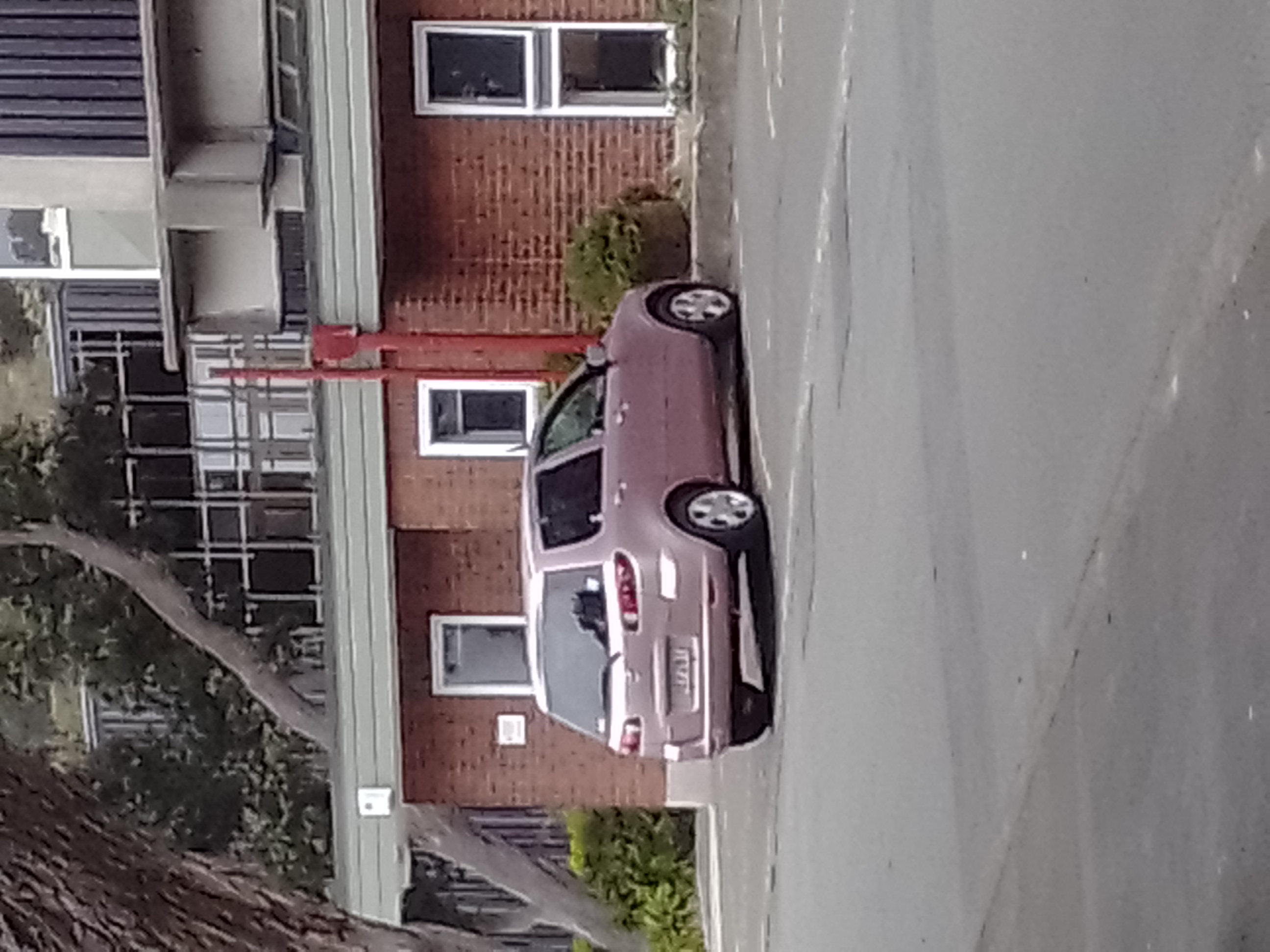 High quality photo of Aroha's car in the headmaster's carpark